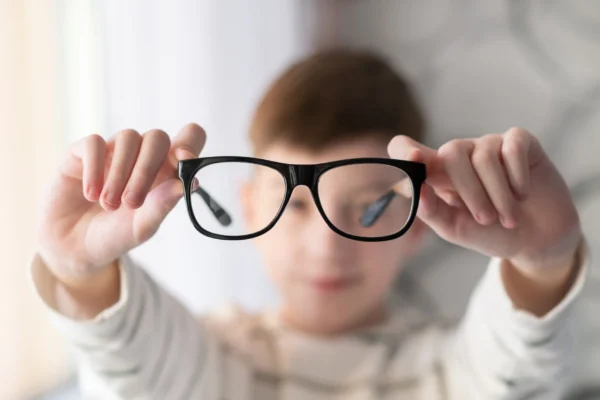 Kid checking glasses